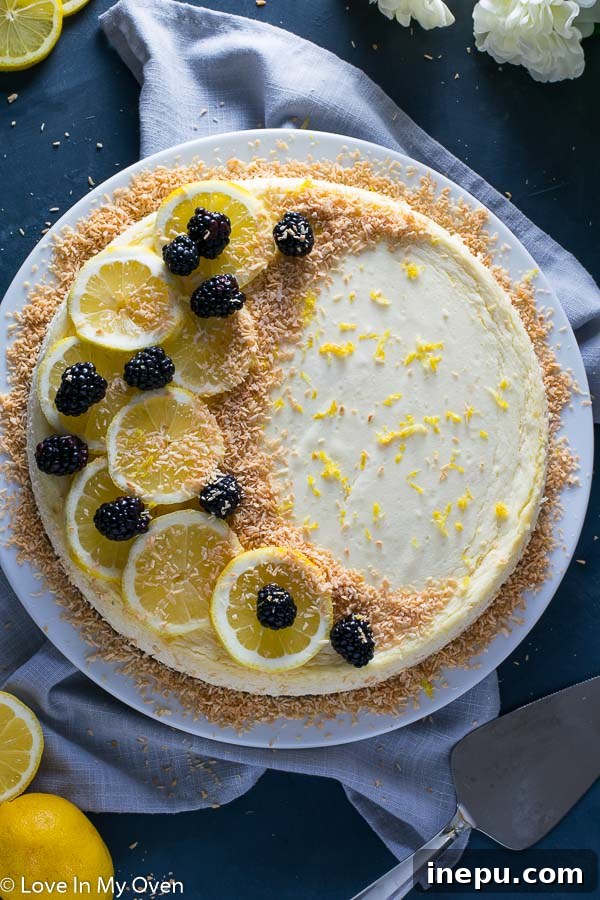 Close-up of a slice of Keto Coconut Lemon Cheesecake revealing creamy texture