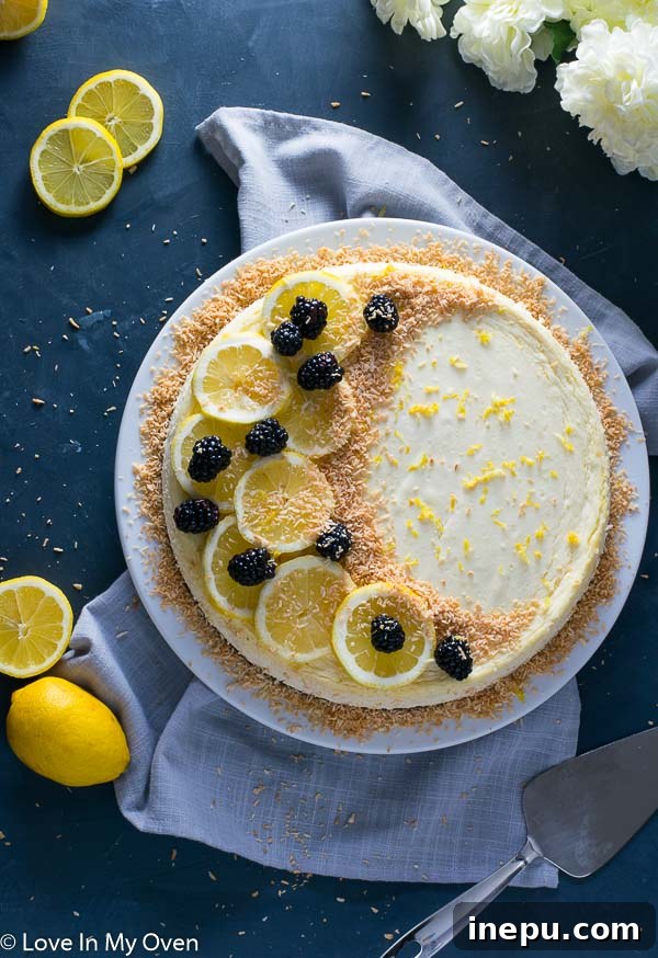 Slice of Keto Coconut Lemon Cheesecake with a fork