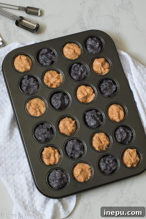 Overhead shot of mini sweet potato muffins on a cooling rack