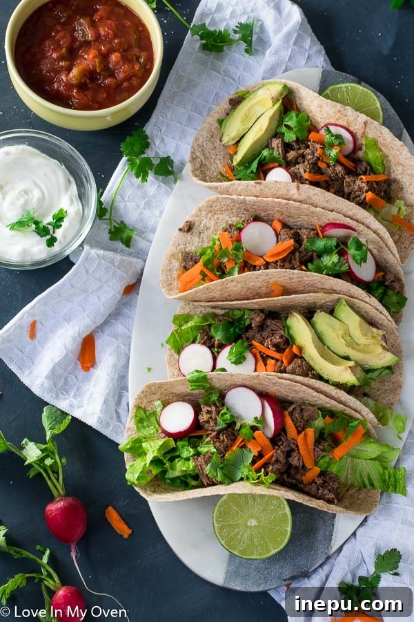 Close-up of shredded beef barbacoa ready for tacos, cooked in an Instant Pot.