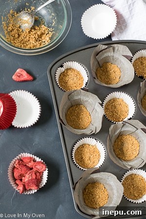 Strawberry S'mores Dream Cupcakes 5 Mixing graham cracker crumbs with butter