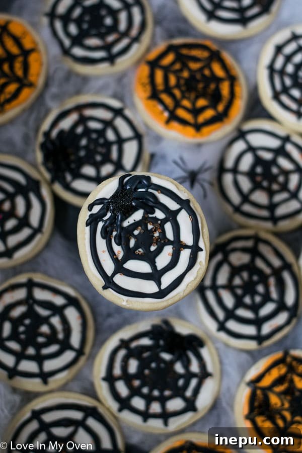 Close-up of Halloween Spiderweb and Pumpkin Cookies