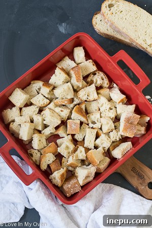 adding cream cheese to french toast bake