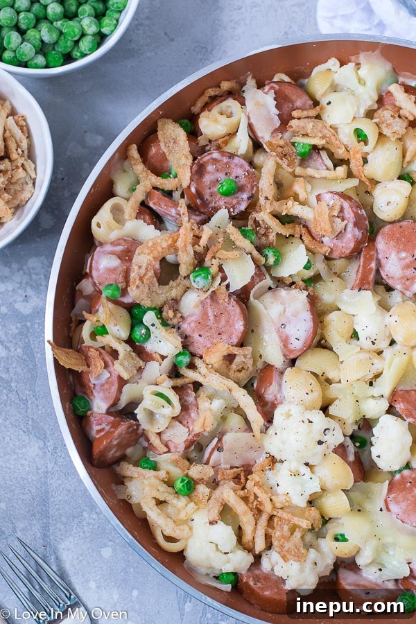 finished veggie and sausage pasta skillet with crispy onions