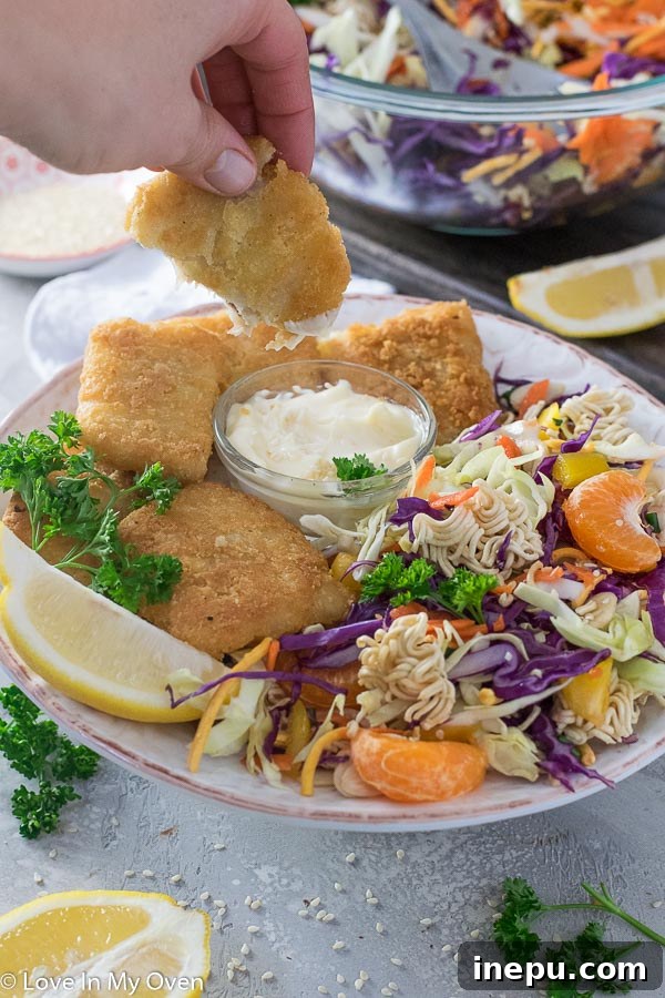 Crispy Ramen Salad Delight 7 Crunchy Ramen Noodle Salad and Fish Fillets Plated