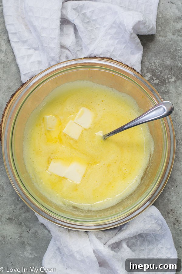 Cooked Meyer lemon curd in a pot