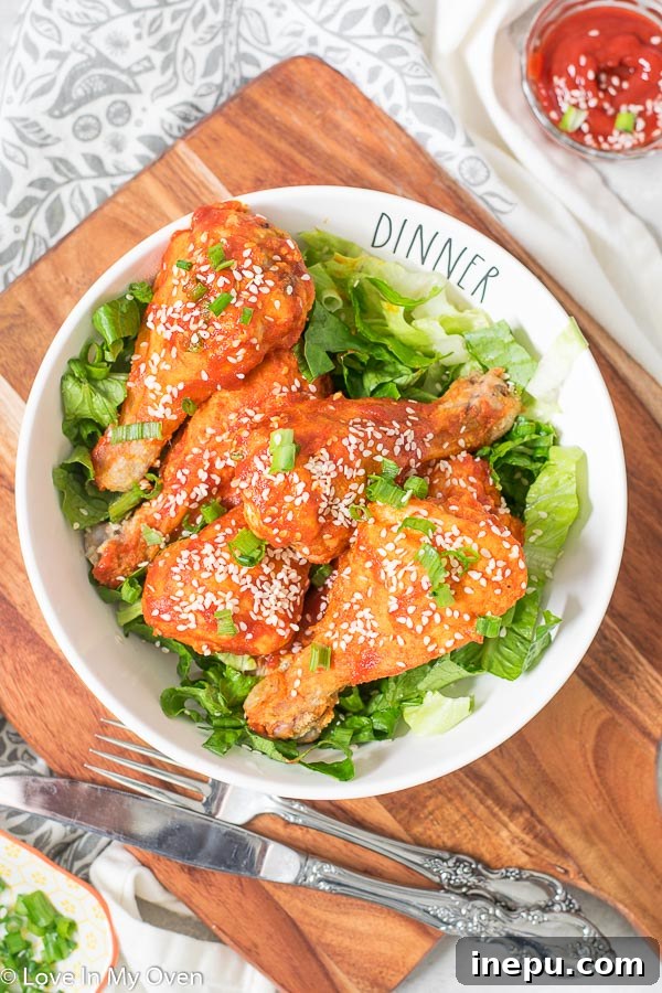 Sticky Sriracha Honey Drumsticks 2 honey sriracha chicken drumsticks
