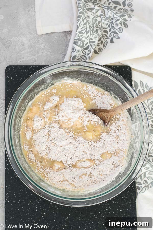 Wholesome Banana Loaf 5 mixing healthier banana bread batter
