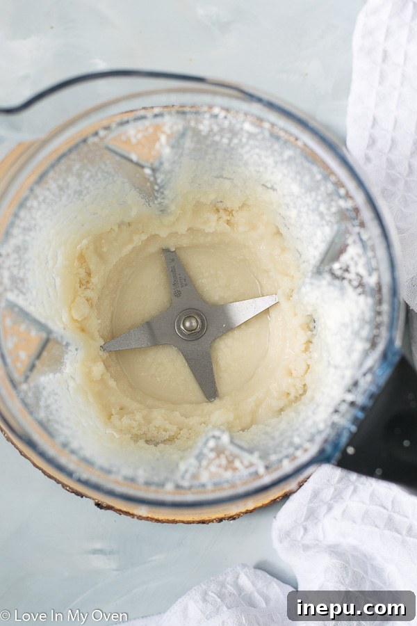 Tropical Nut Butter Bliss 5 Smooth, creamy coconut butter in a food processor