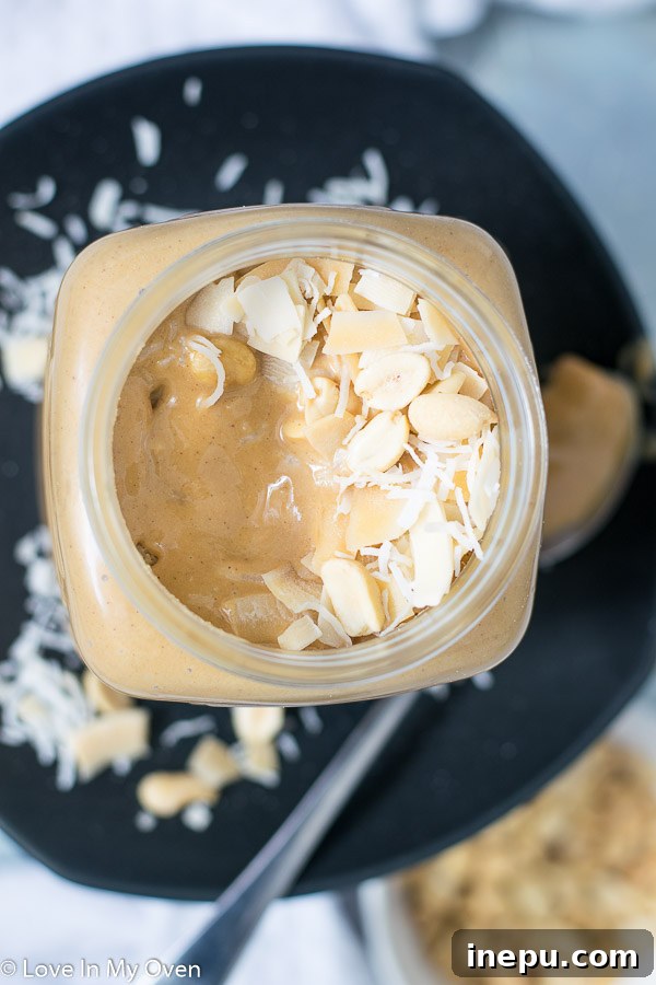 Tropical Nut Butter Bliss 7 Another view of the coconut peanut butter with a spoon