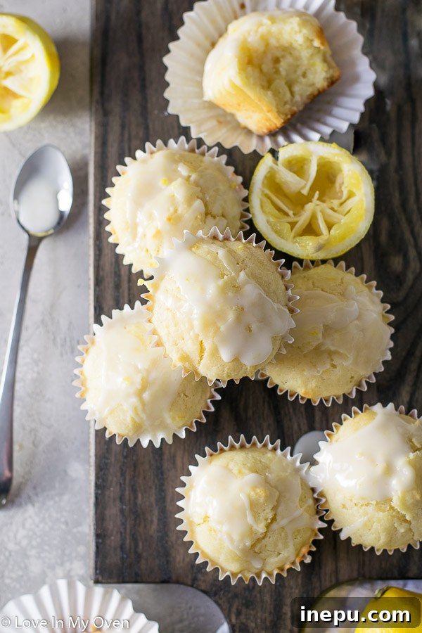 Zesty Lemon Glazed Muffins 8 Glazed lemon muffins ready to eat