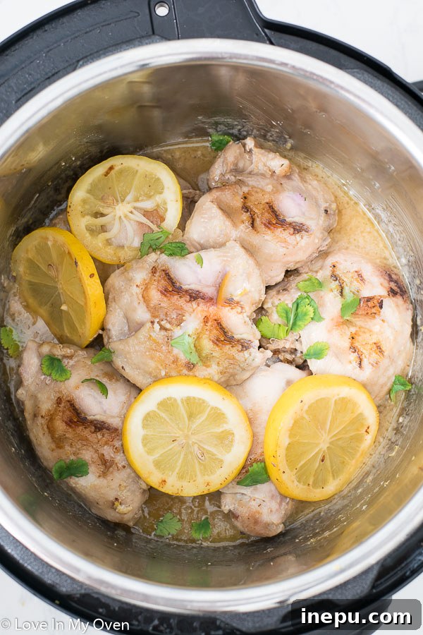 Close-up of cooked Instant Pot Lemon Garlic Chicken Thighs