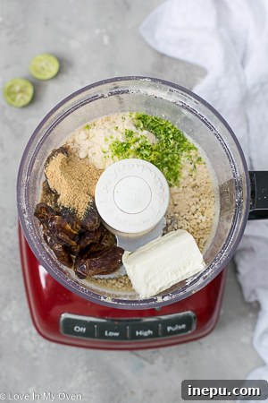Rolling the key lime cheesecake bite mixture into perfect spheres