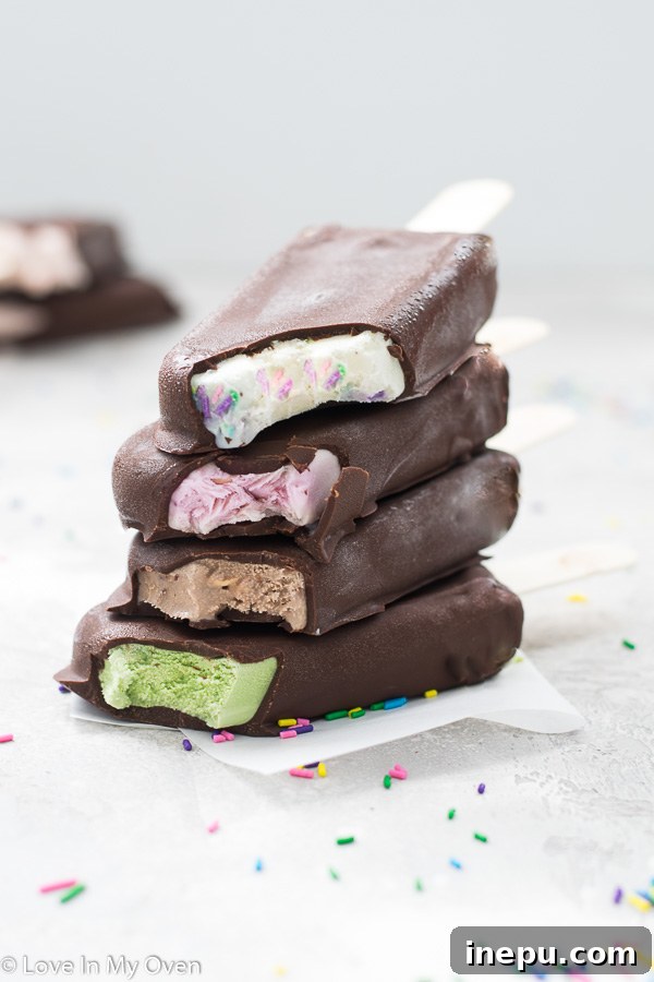 Delicious homemade chocolate dipped ice cream bars ready to be enjoyed on a stick