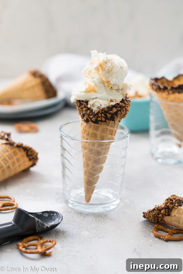 Generous scoop of salted caramel pretzel ice cream in a bowl