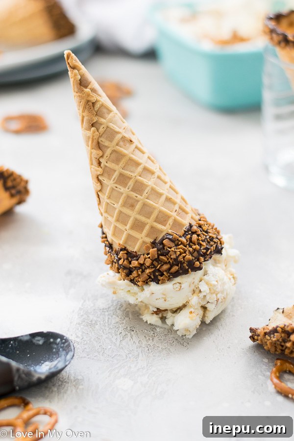 Overhead shot of salted caramel pretzel ice cream with a pretzel garnish