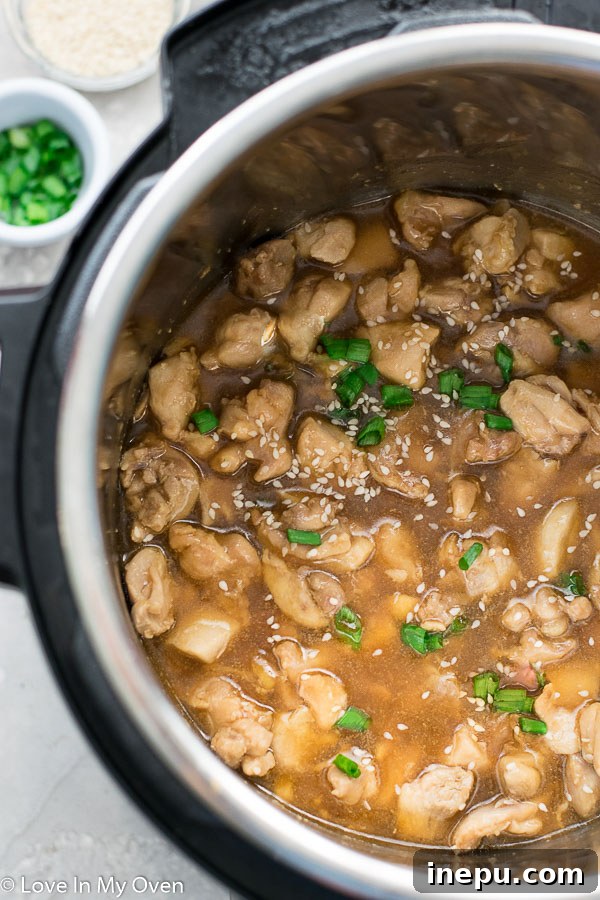 Instant Pot Sesame Chicken close-up with sauce