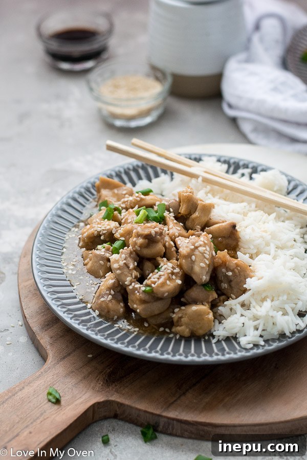 Instant Pot Sesame Chicken on a cutting board