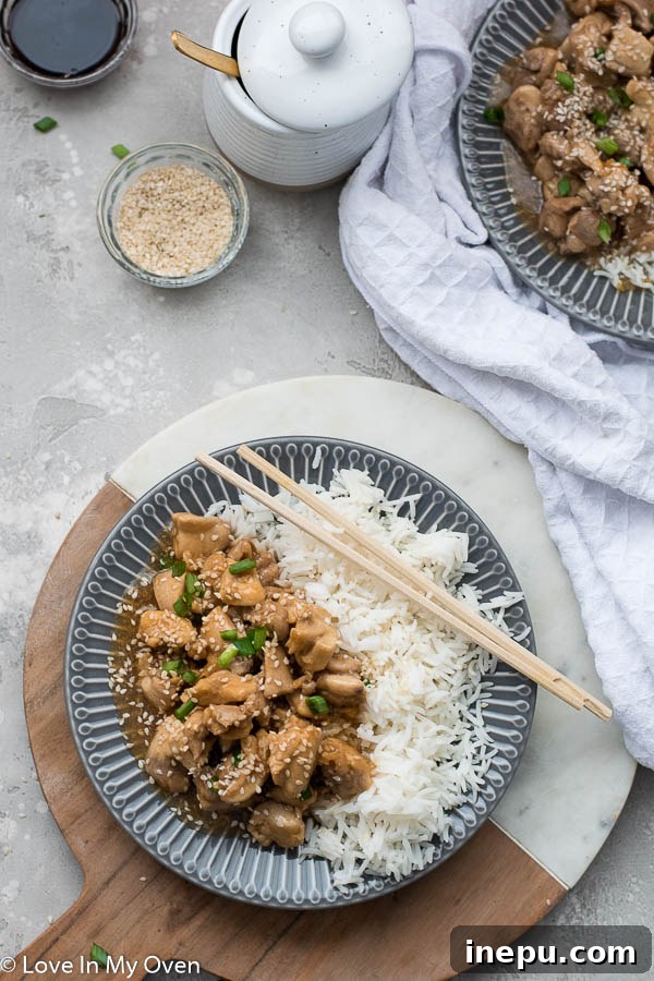 Instant Pot Sesame Chicken with chopsticks