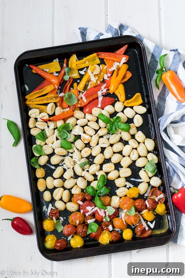 Golden Crunch Gnocchi Bake 2 Crispy Sheet Pan Gnocchi with sweet mini bell peppers and cherry tomatoes