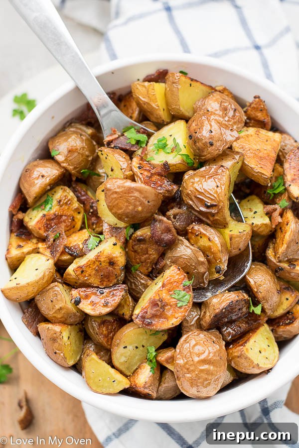 Foolproof Oven Roasted Potatoes 8 Final dish of easy oven roasted potatoes garnished with fresh herbs