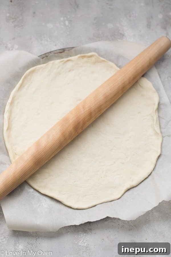 Sweet Pear and Tangy Goat Cheese Pizza 4 Pear and Goat Cheese Pizza on a cutting board