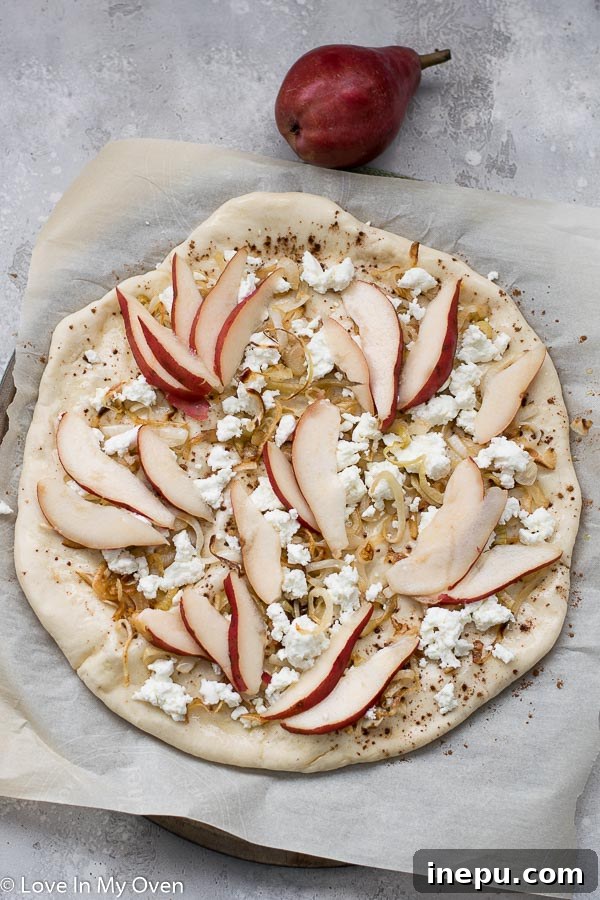 Sweet Pear and Tangy Goat Cheese Pizza 5 Pear and Goat Cheese Pizza baking in oven