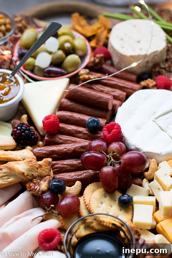 Gobble & Graze Board 5 Fully assembled turkey charcuterie board with a rich assortment of ingredients, ready for serving