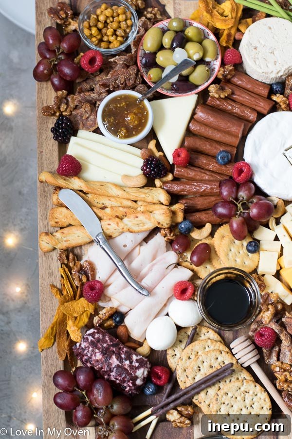 Gobble & Graze Board 7 Side view of a bountiful turkey charcuterie board, highlighting the various layers of ingredients