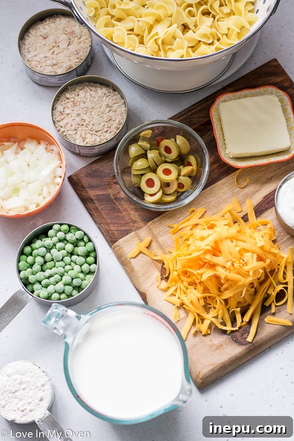 Golden Cheesy Tuna Bake 4 Cheesy Tuna Casserole with a hint of green olives