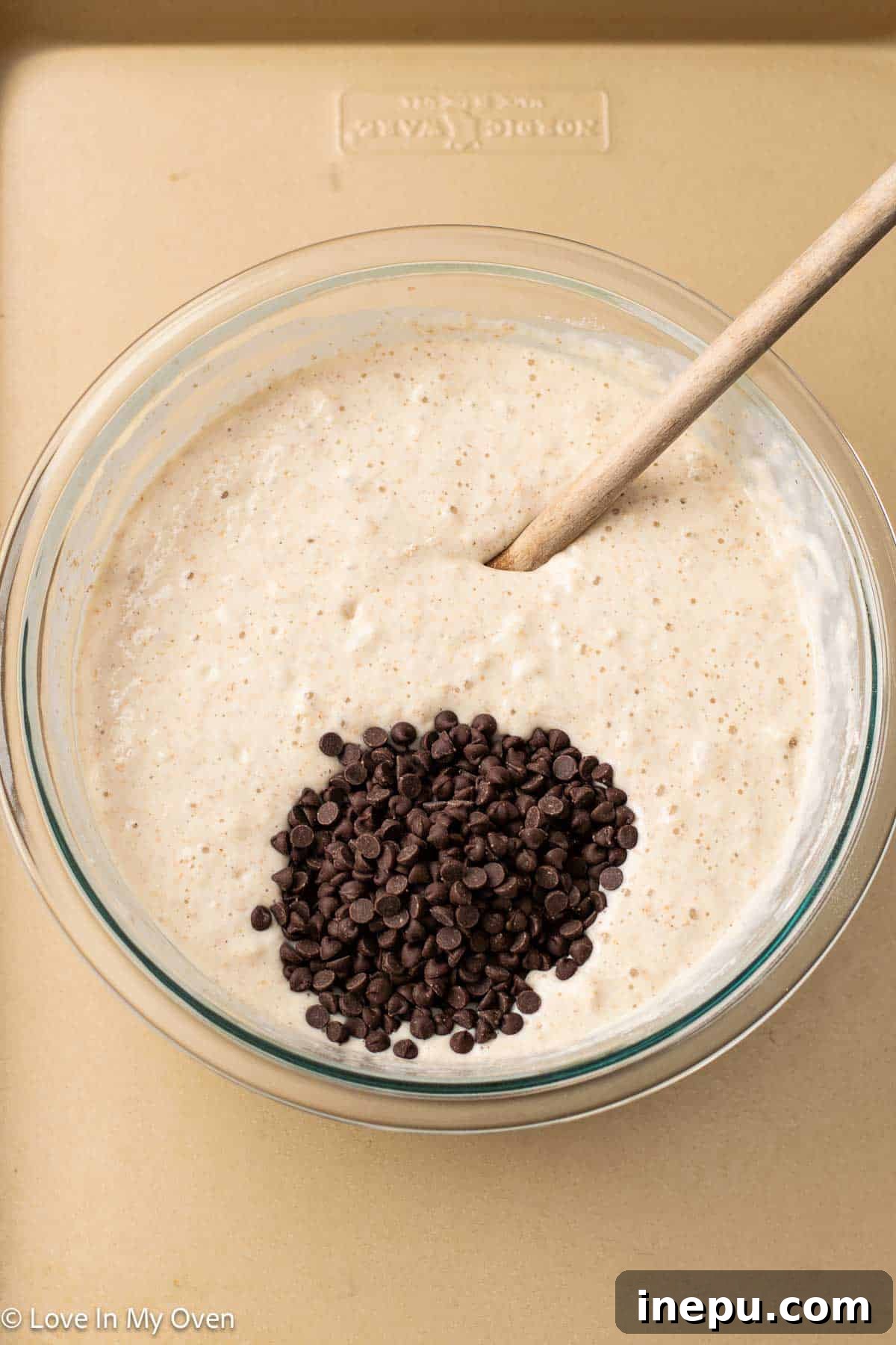 Spreading pancake batter on a sheet pan