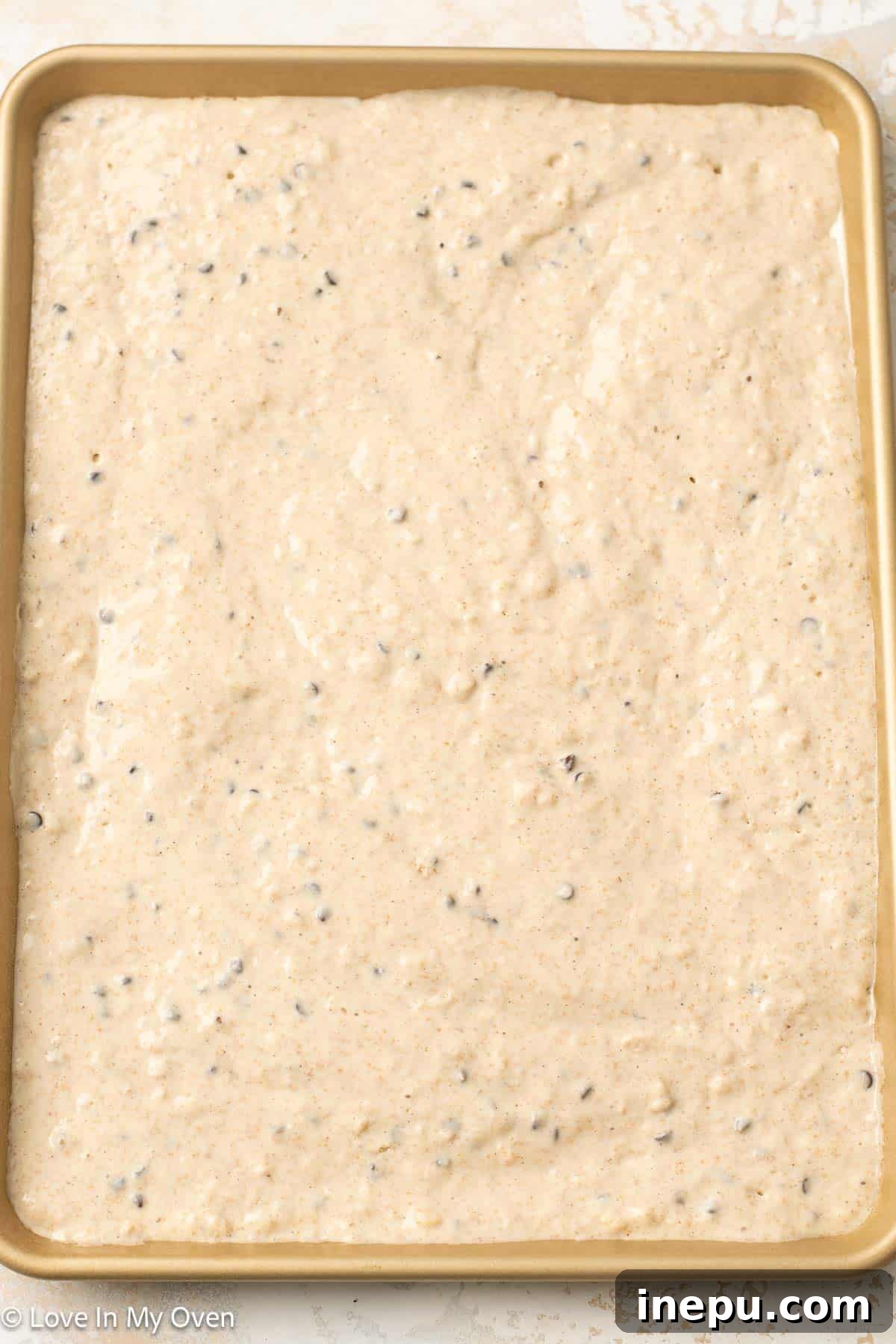 Sheet pan pancakes baking in the oven