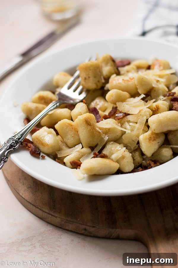 Pillowy Homemade Cauliflower Gnocchi 11 Freshly prepared cauliflower gnocchi on a plate