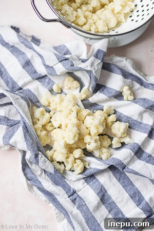 Draining cooked cauliflower for gnocchi