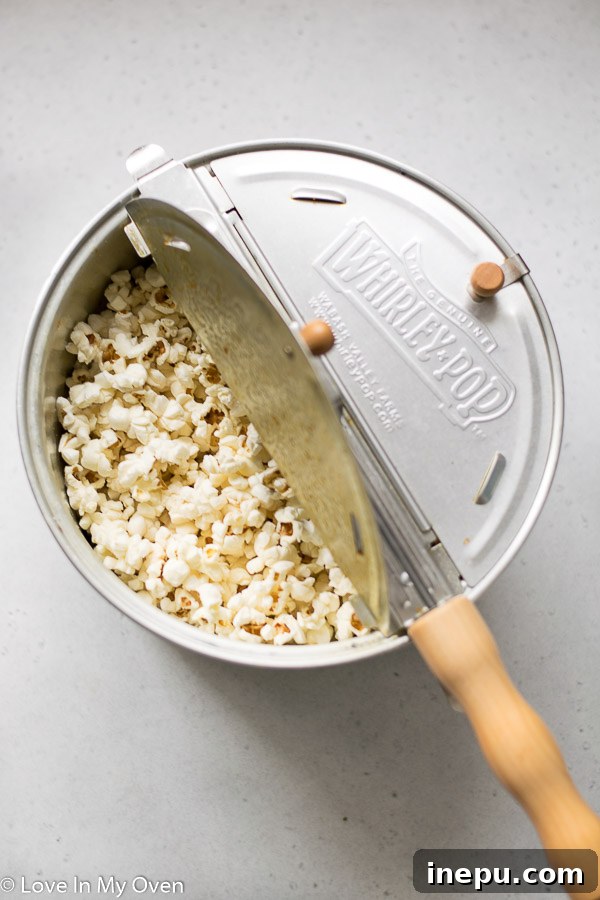 Guilt-Free Caramel Popcorn 4 Popcorn kernels popped and ready for caramel coating