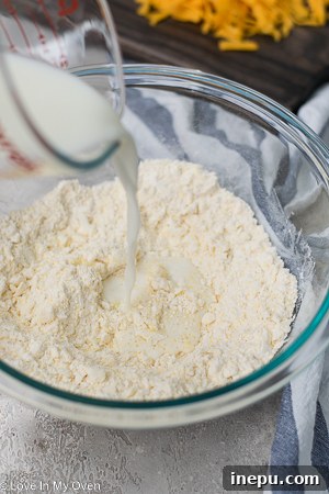 mixing dry ingredients for biscuits