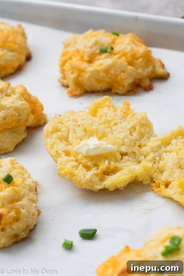 Homestyle Cheesy Corn Drops 7 stack of warm cheesy cornmeal drop biscuits