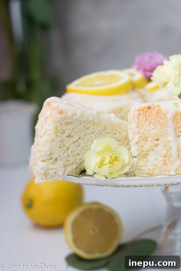 lemon angel food cake with glaze and berries