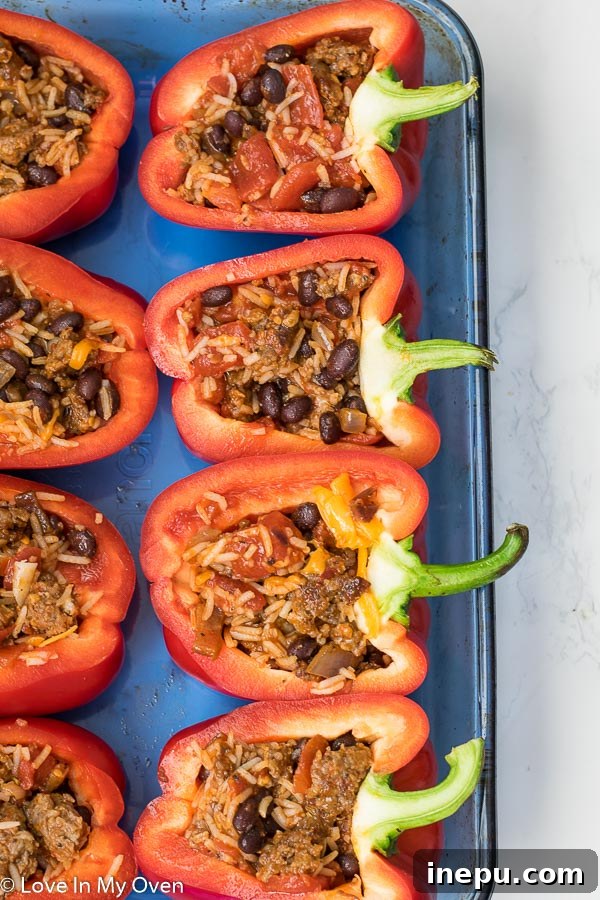 Smoky Chorizo Stuffed Bell Peppers 6 Mixing the stuffed pepper filling