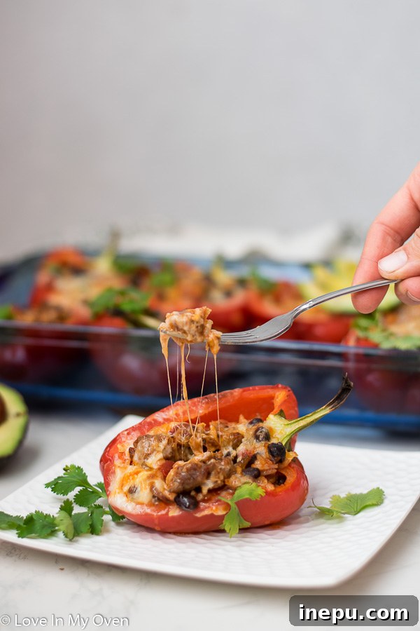 Smoky Chorizo Stuffed Bell Peppers 9 Stuffed peppers on a platter