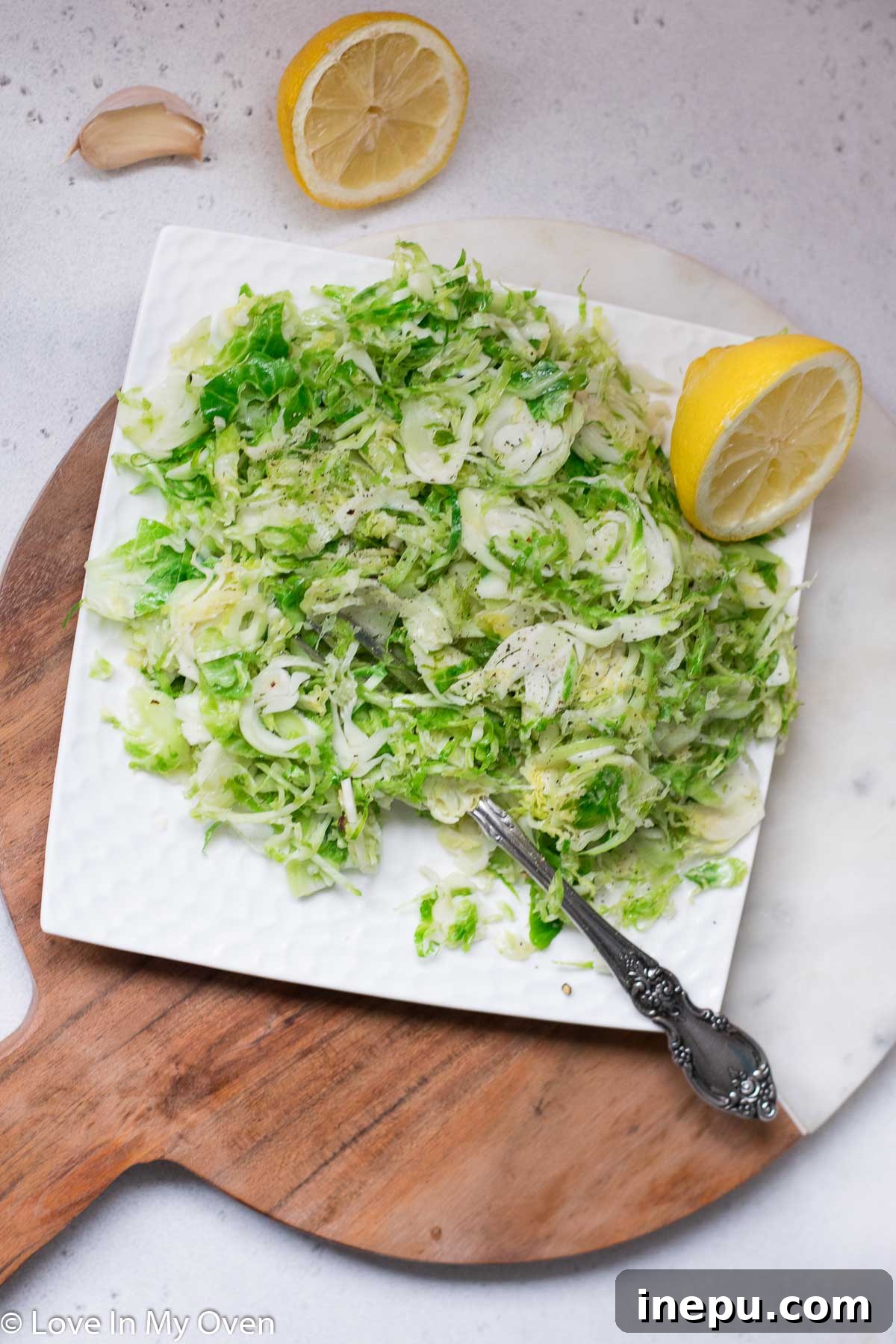 Crispy Shredded Brussels Sprouts with Garlic 3 Close-up of freshly sautéed shredded Brussels sprouts with garlic and lemon