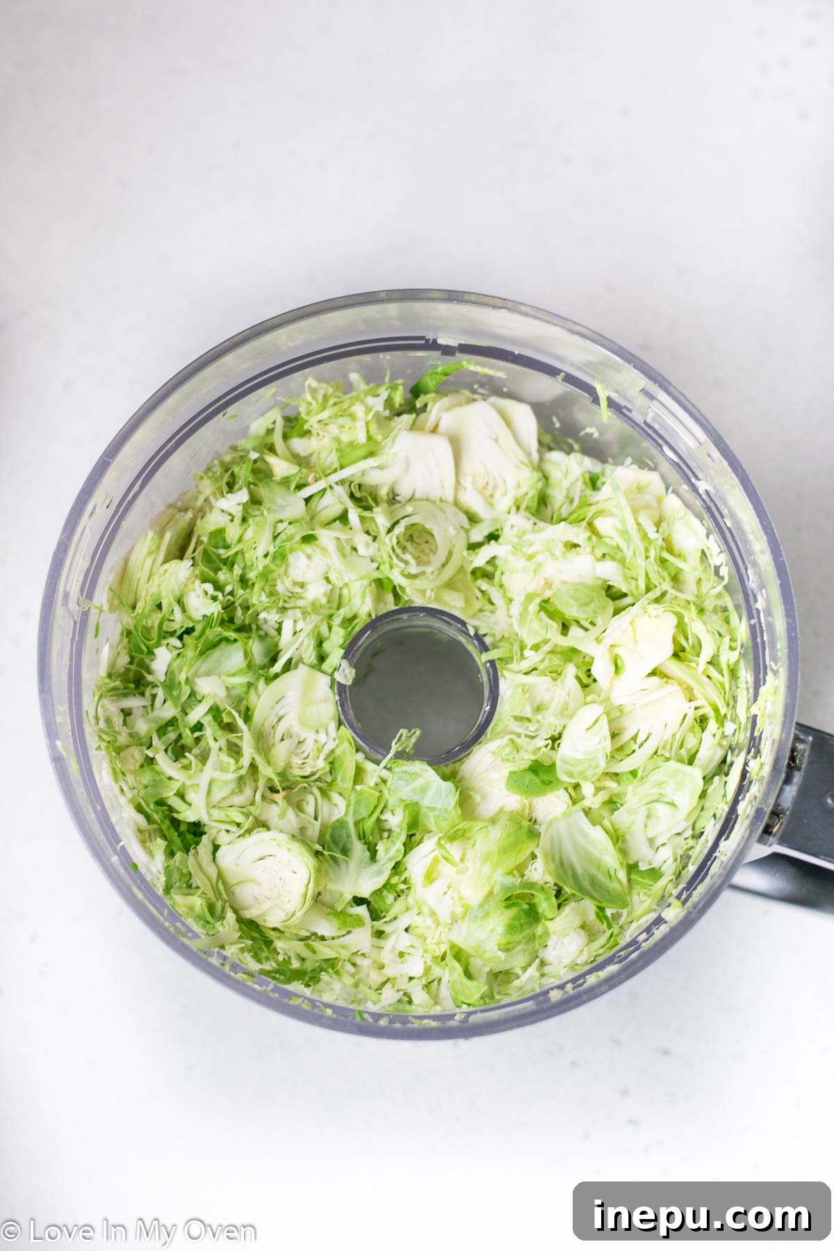 Crispy Shredded Brussels Sprouts with Garlic 5 Shredded Brussels sprouts in a bowl, ready for cooking