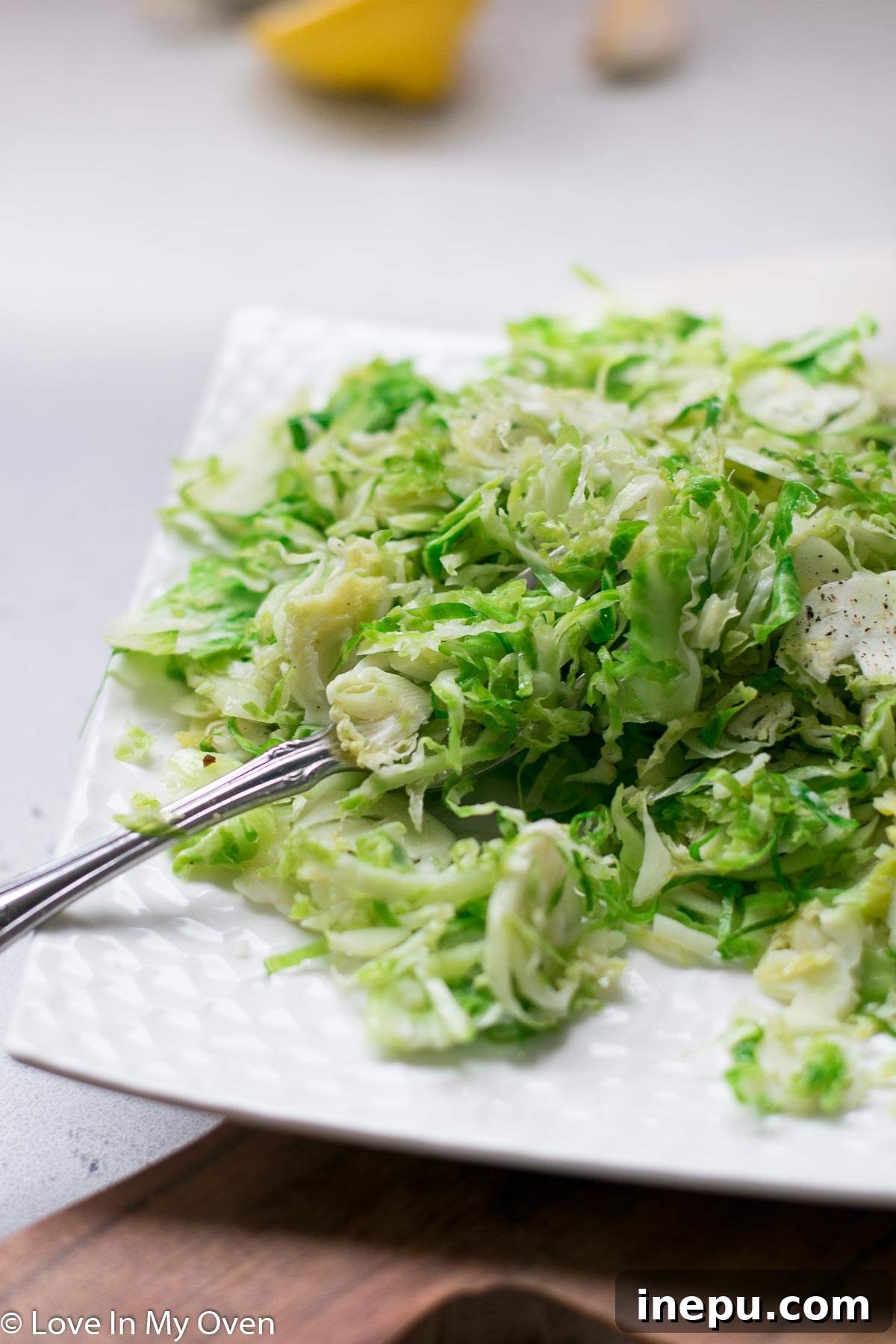 Crispy Shredded Brussels Sprouts with Garlic 8 Garnished Sautéed Shredded Brussels Sprouts close-up