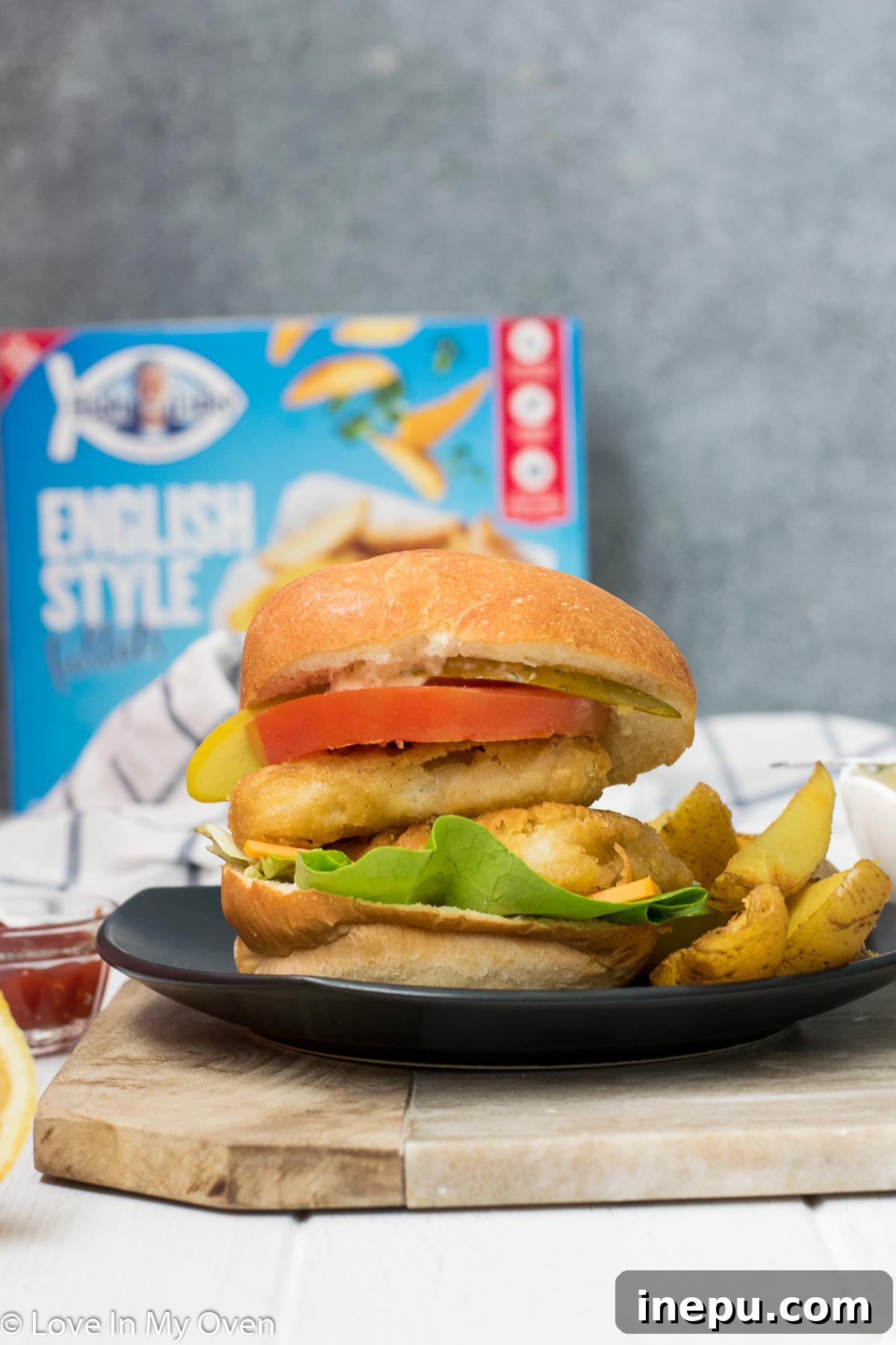 Crispy Fish Burger with Oven Roasted Potato Wedges and Lemon-Garlic Aioli