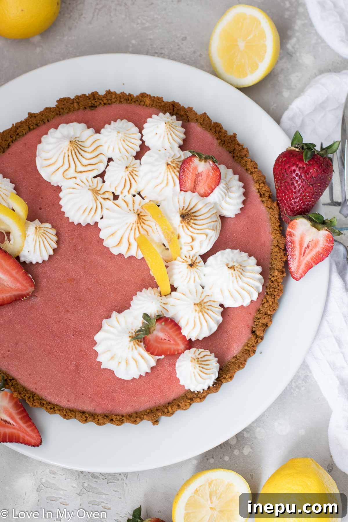 Close-up of a Slice of Strawberry Lemon Curd Tart with a Textured Gingersnap Crust