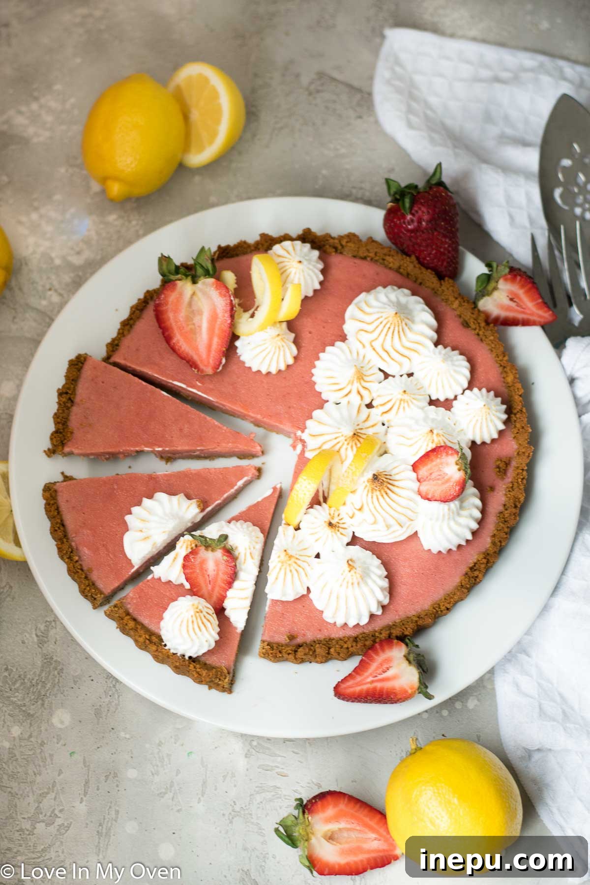 Elegant Whole Strawberry Lemon Curd Tart Topped with Toasted Meringue Swirls
