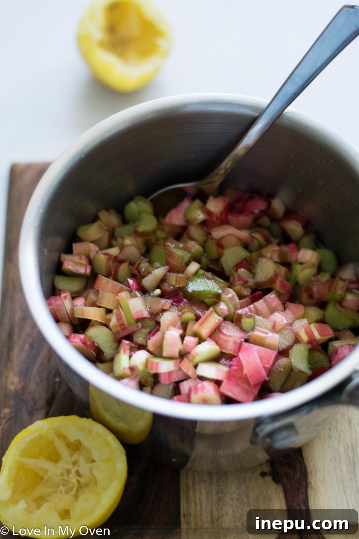 Rhubarb mixture gently simmering in a saucepan