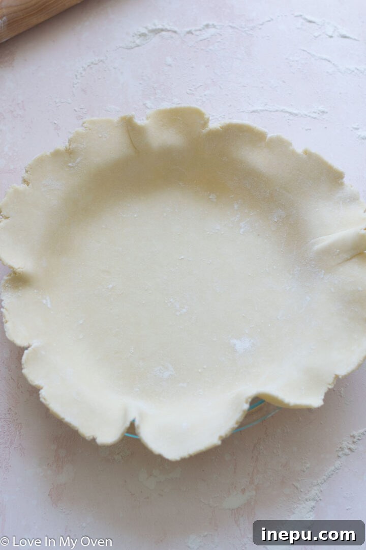 Placing pie crust in a pie plate