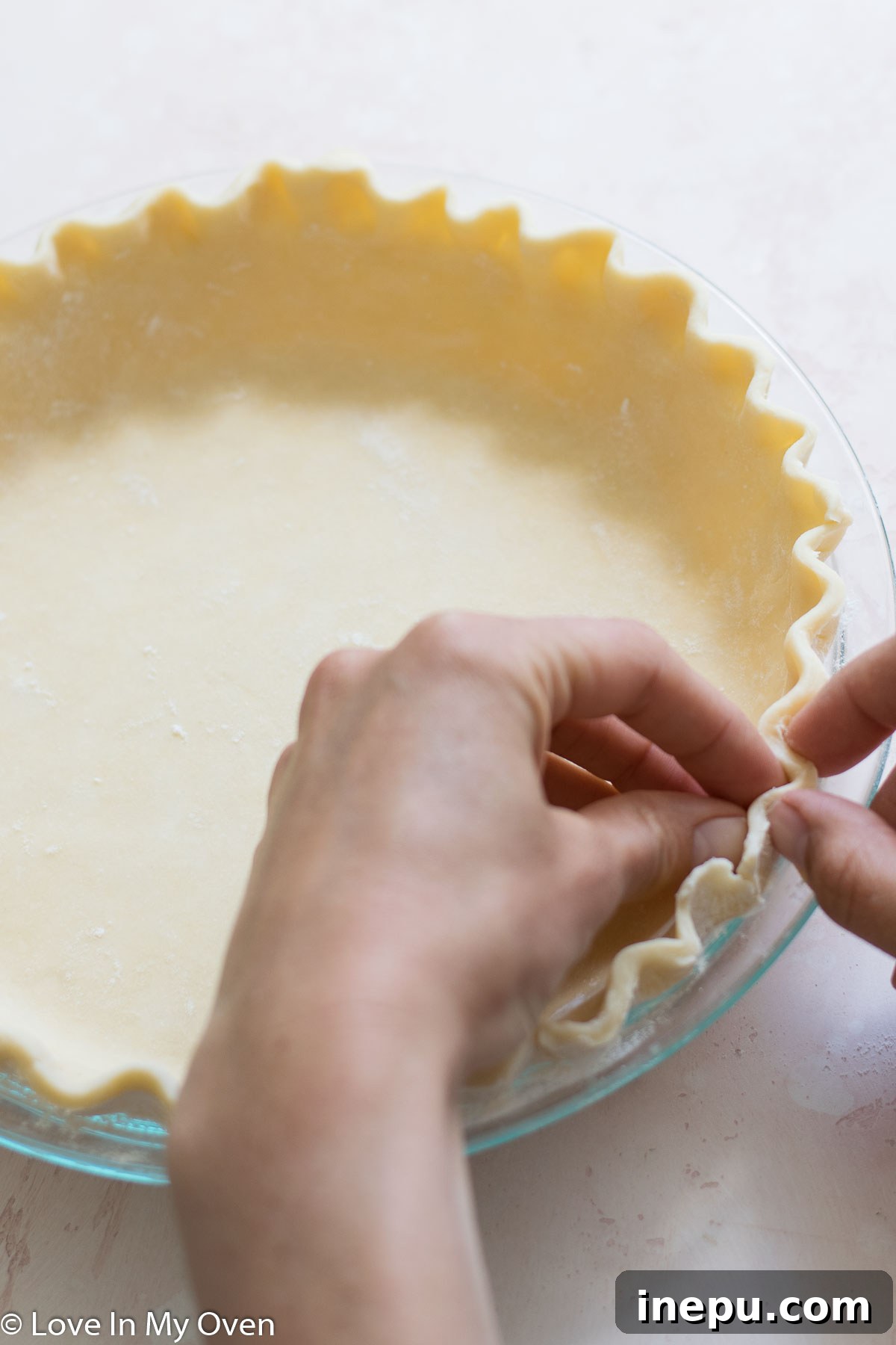 Beautifully crimped edge of an all butter pie crust