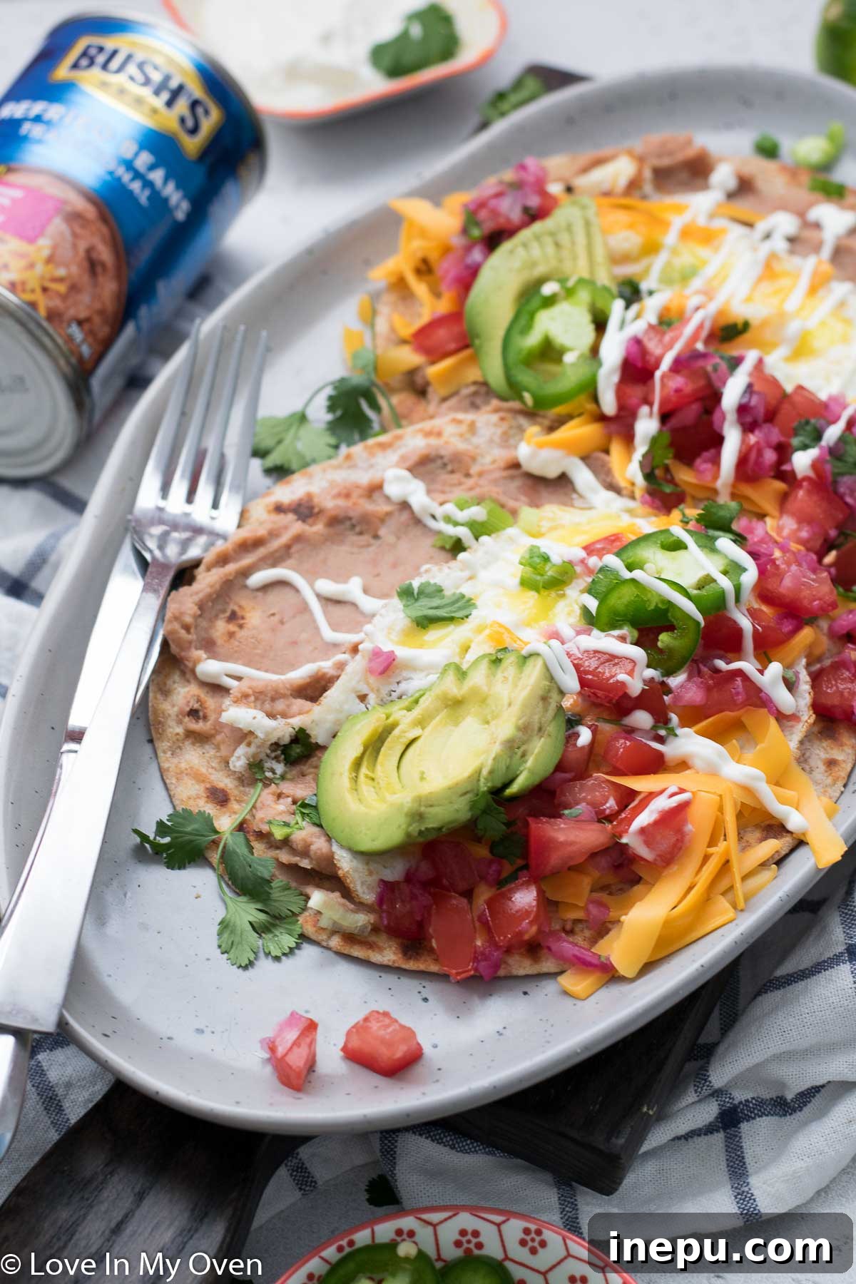 No-Fuss Huevos Rancheros 8 Overhead shot of easy huevos rancheros with various toppings